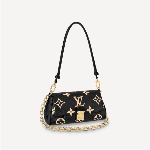 Louis Vuitton Favourite Bi-Color Monogram Empreinte Leather - Picture 1 of 14